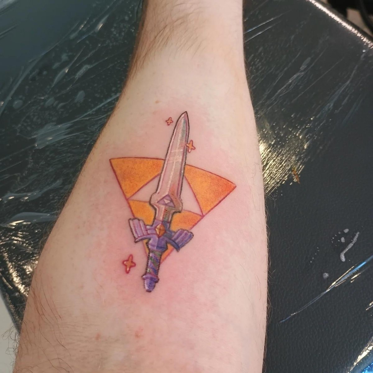Photo of the tattoo titled First ink: Legend of Zelda Triforce