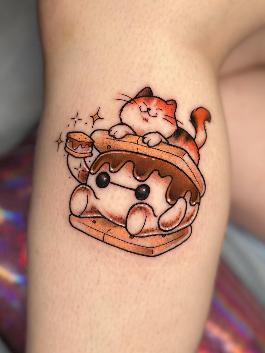 Photo of the tattoo titled Baymax and Mochi's Sweet Embrace