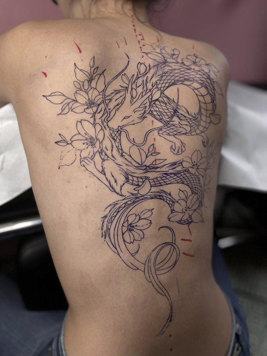 Photo of the tattoo titled Client's First Tattoo: Dragon Backpiece