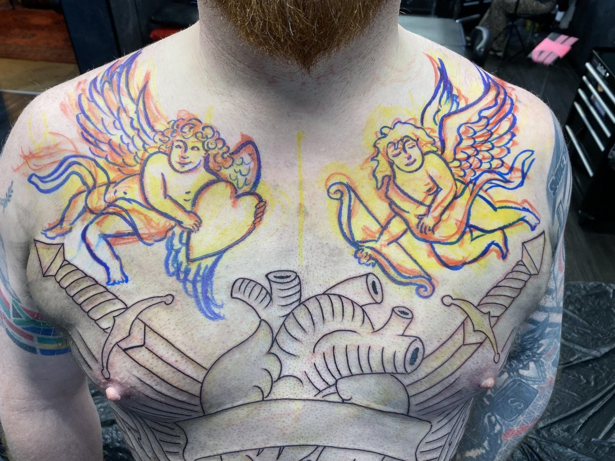 Photo of the tattoo titled Hand-Drawn Chest Piece Evolved