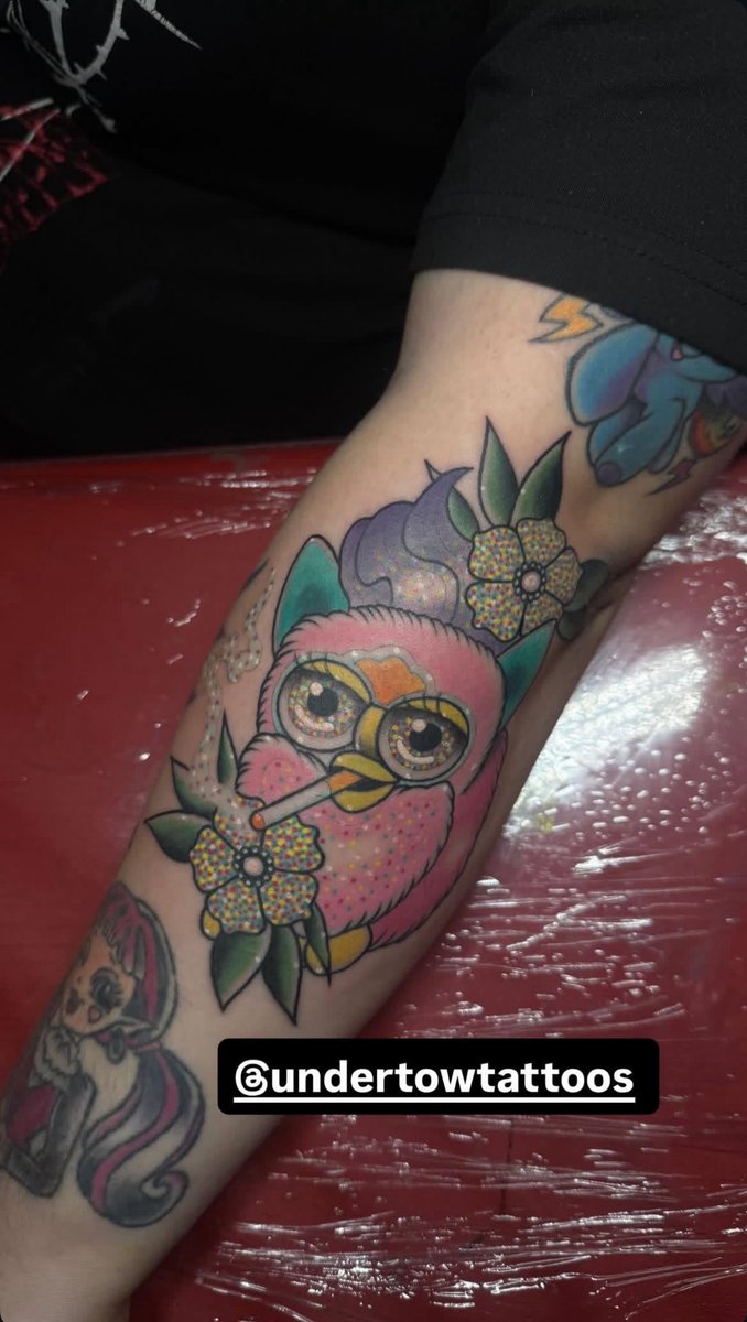 Photo of the tattoo titled My Smoking Furby Masterpiece