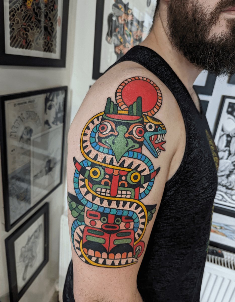 Photo of the tattoo titled Snake on Totem Pole