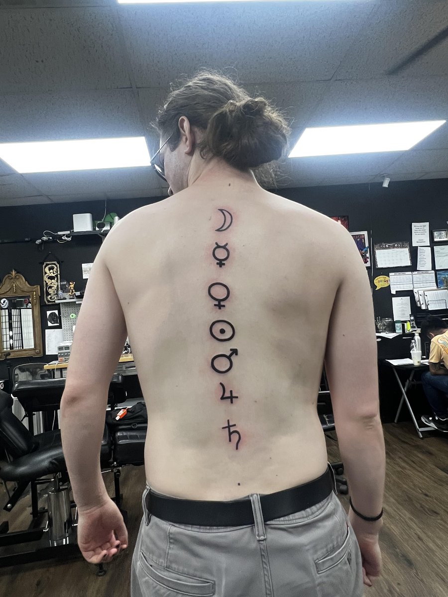 Photo of the tattoo titled Spine Ink and Sitting Struggles